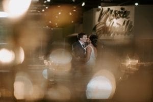  Bride and groom kissing during their private last dance during their reception in Marie Gabrielle