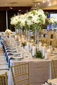 View of the room with guest tables and head tables in the reception room