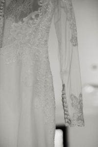 Closeup of the wedding dress with lace detail